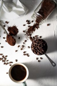 goldstruck coffee flat lay beans grounds cup