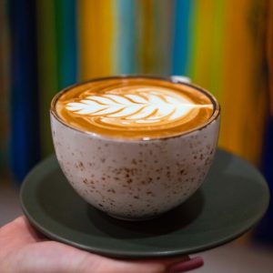 goldstruck coffee cup with a stylish leaf design